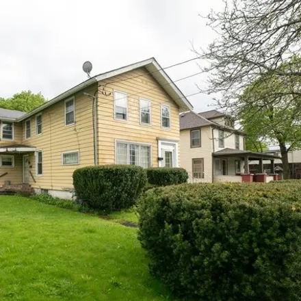 Buy this 4 bed house on 706 East Washington Avenue in City of Elmira, NY 14901