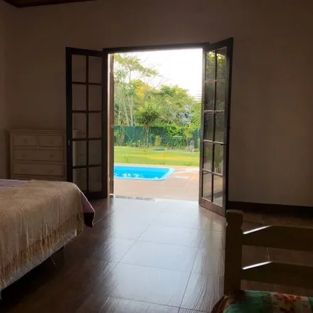 Rent this 4 bed house on Arujá