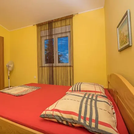 Rent this 4 bed apartment on 51260 Crikvenica