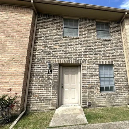 Rent this 2 bed townhouse on 3802 Laurel Avenue in Caldwood, Beaumont