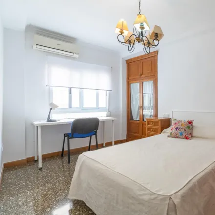 Rent this 4 bed room on Carrer de Cebrian Mezquita in 10, 46007 Valencia