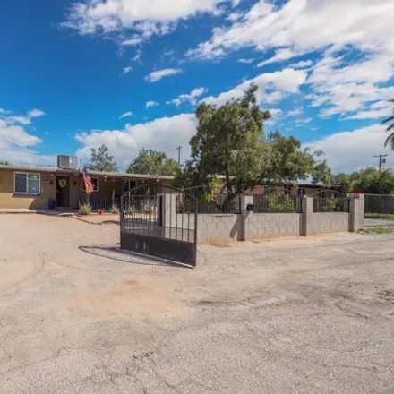 Buy this 4 bed house on 4461 East 28th Street in Tucson, AZ 85711