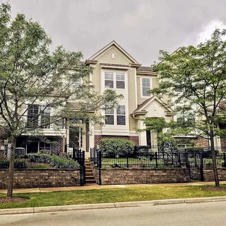Buy this 3 bed townhouse on 422 Grosvenor Lane in Aurora, IL 60504