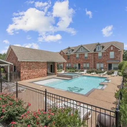 Buy this 4 bed townhouse on 2598 Central Park Lane in College Station, TX 77840