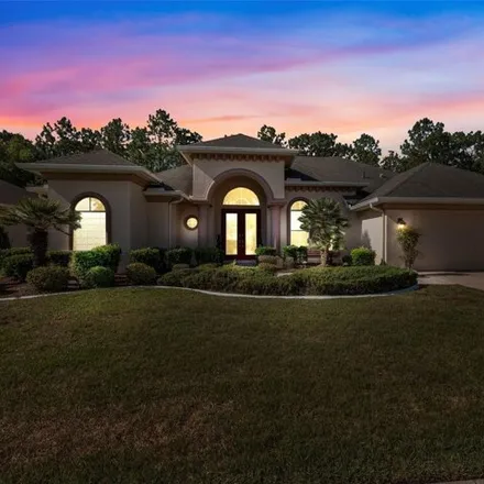Buy this 4 bed house on 5382 Legend Hills Lane in Spring Hill, FL 34609