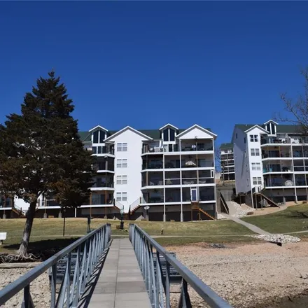 Buy this 4 bed condo on 651 Park Place Drive in Camden County, MO 65047