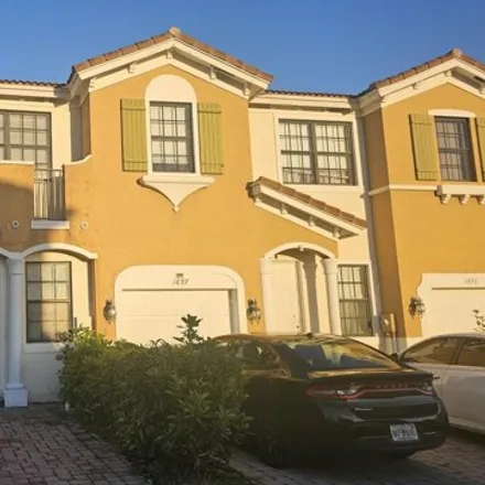 Buy this 4 bed townhouse on 1730 Umbria Street in Port Saint Lucie, FL 34953