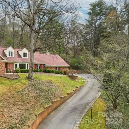 Buy this 4 bed house on 250 Elk Mountain Scenic Highway in Asheville, NC 28804