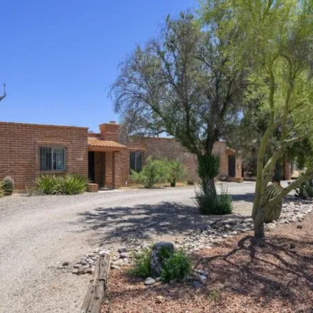 Buy this 6 bed house on 1986 West Ahmed Avenue in Casas Adobes, AZ 85704