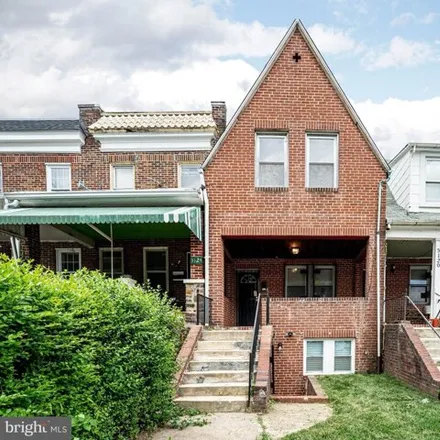 Buy this 4 bed house on 3122 Presstman Street in Baltimore, MD 21216