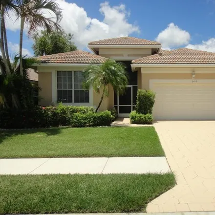 Rent this 3 bed house on 2471 Pigeon Cay in West Palm Beach, FL 33411