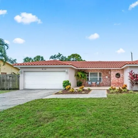 Buy this 3 bed house on 834 NW 7th St in Boca Raton, Florida