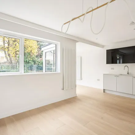 Rent this 4 bed apartment on Woodsford square garden in Addison Road, London