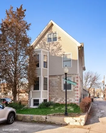 Buy this 6 bed duplex on 2180 West Sunnyside Avenue in Chicago, IL 60640