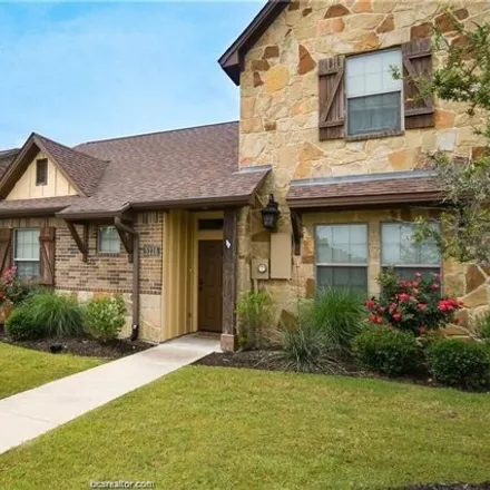 Rent this 3 bed house on 3228 Travis Cole Avenue in Koppe, College Station