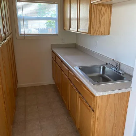 Rent this 3 bed apartment on 6th Avenue 7th Avenue Alley in Sacramento, CA 95817
