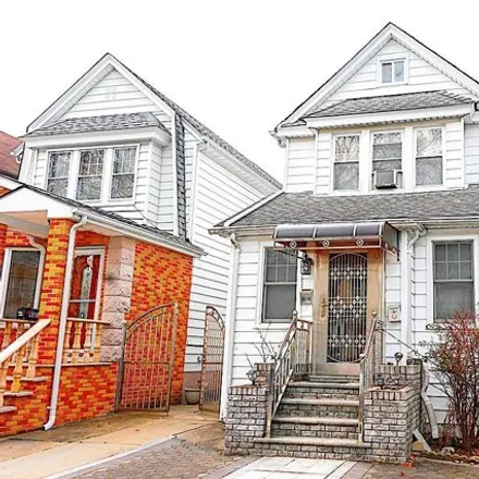 Buy this 3 bed house on 93-14 Vanderveer Street in New York, NY 11428