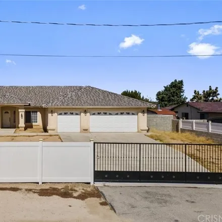 Buy this 4 bed house on 6716 Paw Paw Avenue in Hesperia, CA 92345