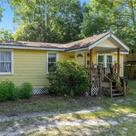 Buy this 3 bed house on 1211 NW 4th St in Gainesville, Florida
