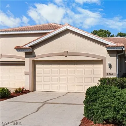 Buy this 3 bed house on 2209 Carnaby Ct in Lehigh Acres, Florida