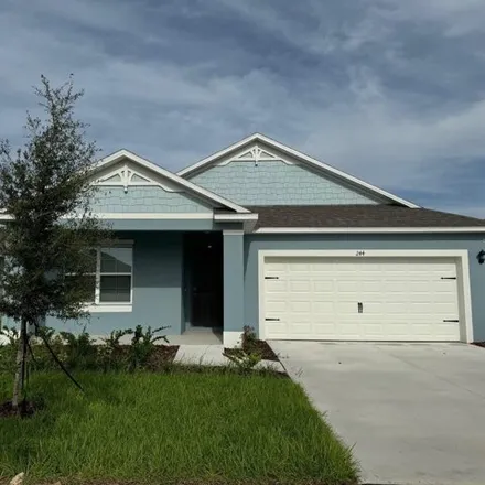Rent this 4 bed house on 244 Taylor Groves St in Lake Wales, Florida