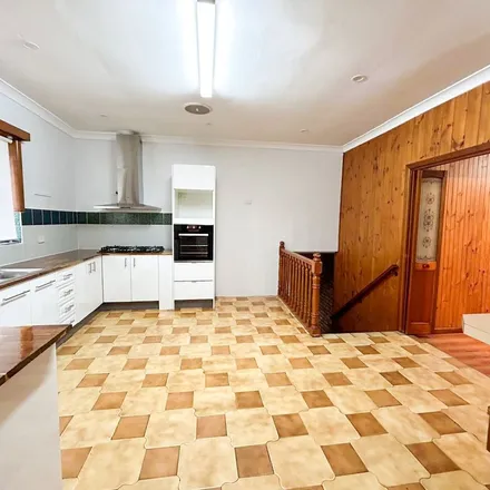 Rent this 4 bed apartment on Marion Street in Condell Park NSW 2200, Australia