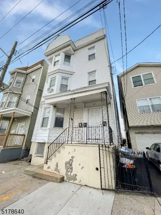 Buy this 9 bed townhouse on 433 South 10th Street in Newark, NJ 07103