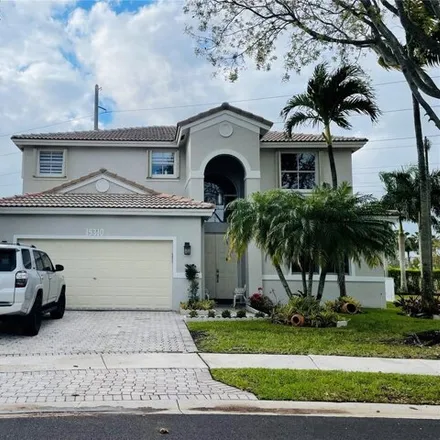 Rent this 4 bed house on Pembroke Road in Pembroke Pines, FL 33029