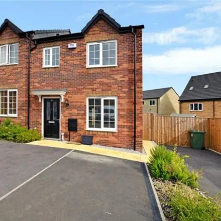 Rent this 3 bed townhouse on Wren Green Way in Wrenthorpe, WF2 0FU