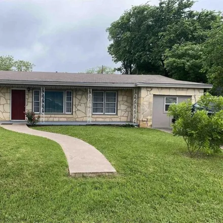 Buy this 3 bed house on Kids Kastle Learning Center in 702 North Vanderveer Street, Burnet