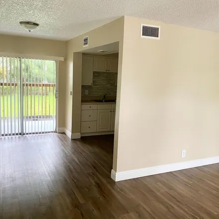 Rent this 2 bed apartment on 3199 Rudolph Road in Palm Springs, FL 33461