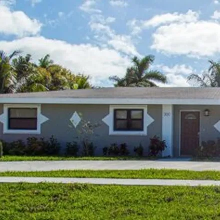 Rent this 4 bed house on 308 Southwest 12th Avenue in Boynton Beach, FL 33435