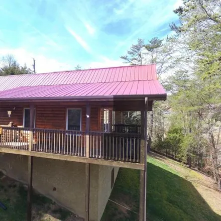Buy this 2 bed house on 1003 Powder Springs Rd in Sevierville, Tennessee