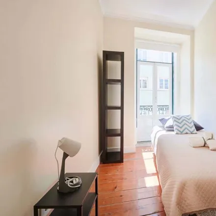 Rent this 6 bed room on Rua do Telhal 43 in 1150-346 Lisbon, Portugal