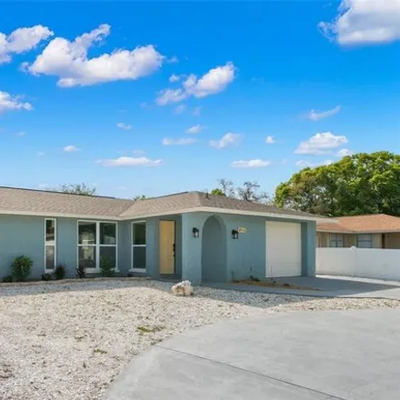 Buy this 3 bed house on 8906 Candlewick Lane in Jasmine Estates, FL 34668