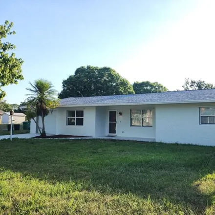 Rent this 3 bed house on 5213 Hummingbird Way in Fort Pierce, Florida