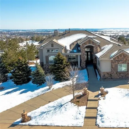 Buy this 6 bed house on 6407 Tremolite Drive in Castle Rock, CO 80108