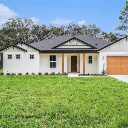 Buy this 4 bed house on 3378 W Early Pl in Citrus Springs, Florida