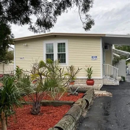 Buy this studio apartment on 5366 79th Street North in Pinellas County, FL 33709