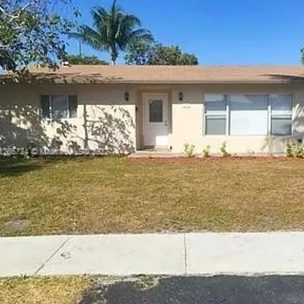 Buy this 4 bed house on 1691 Northwest 2nd Avenue in Kendall Green, Pompano Beach