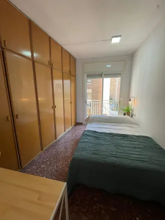 Rent this 6 bed room on Carrer Mare de Déu del Carmel in 5, 08001 Barcelona