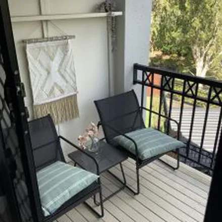 Rent this 3 bed townhouse on Beachcomber Court in Burleigh Waters QLD 4220, Australia