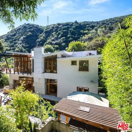 Rent this 6 bed house on 3612 Mandeville Canyon Road in Los Angeles, CA 90049