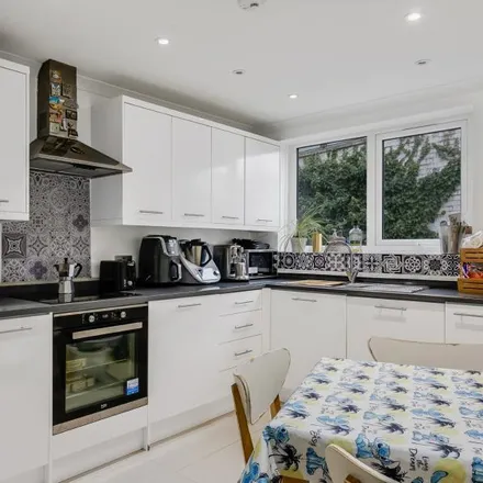 Rent this 4 bed townhouse on West Hampstead Police Station in Burrard Road, London