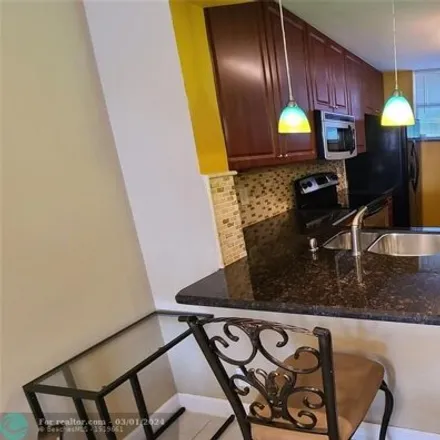 Buy this 2 bed condo on 109 Lake Emerald Drive in Royal Palm Isles, Broward County