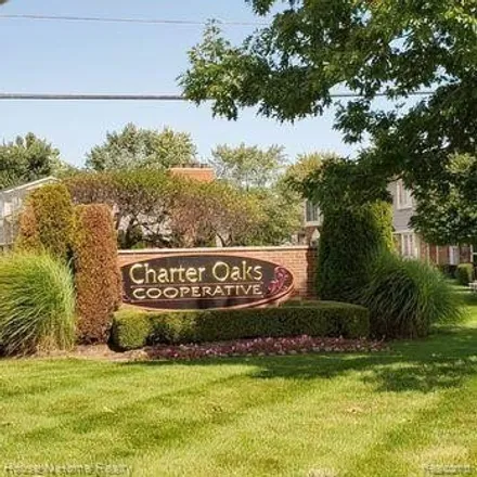 Buy this 2 bed townhouse on 37198 Great Oaks Court in Clinton Charter Township, MI 48036