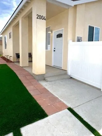 Rent this 2 bed apartment on 2040 West 106th Street in Los Angeles, CA 90047