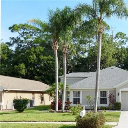 Buy this 4 bed house on 3387 Laurelwood Court in East Lake, FL 34688