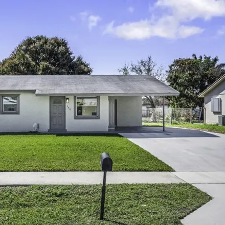 Rent this 3 bed house on 160 19th Avenue Northeast in Boynton Beach, FL 33435