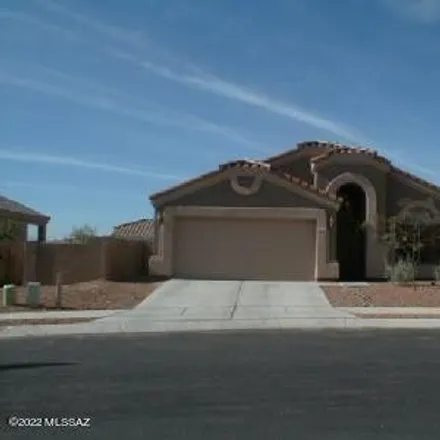 Rent this 4 bed house on 9552 East Shadow Lake Court in Tucson, AZ 85749